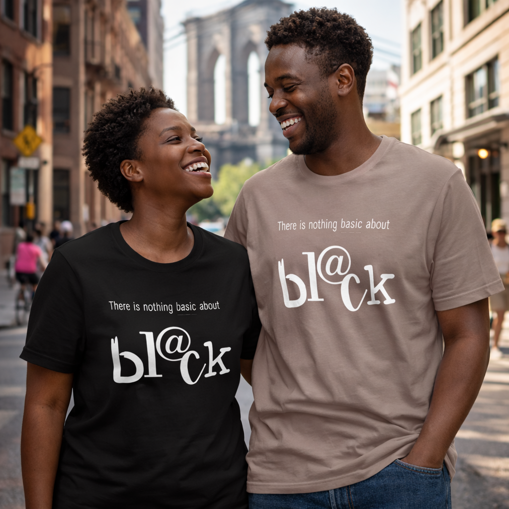 Black couple wearing t-shirts with a message about race in an urban setting.