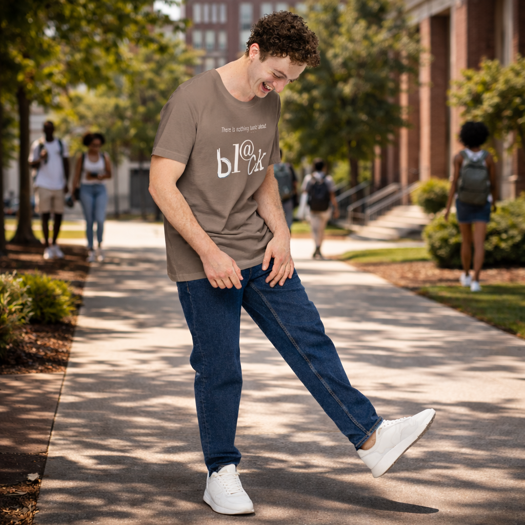 Man walking on a sidewalk with trees and buildings in the background