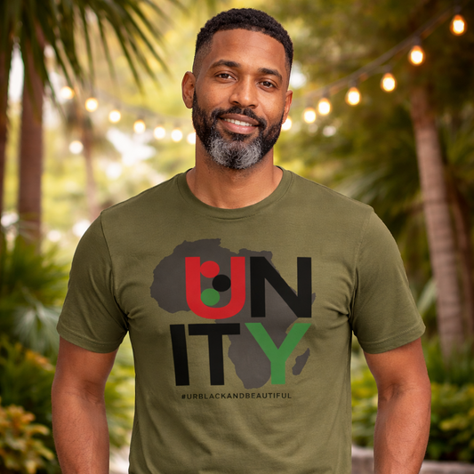Man wearing a olive green t-shirt with 'UNITY' design outdoors